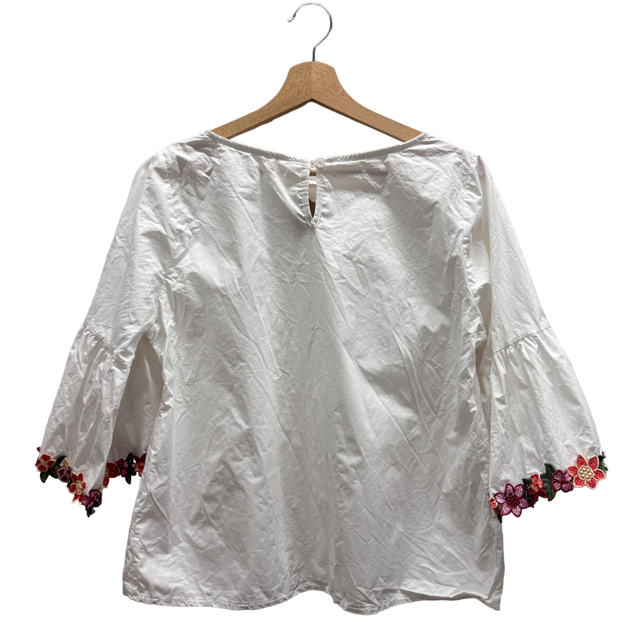 Maglietta maniche 3/4 con fiori alle maniche